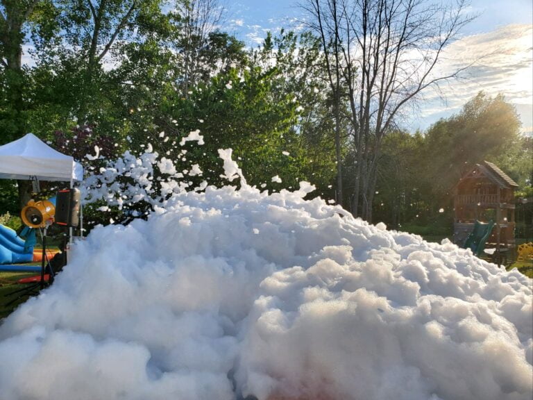 pile of foam in a backyard from a foam party